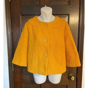 yellow button up jacket